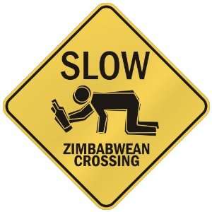   SLOW : ZIMBABWEAN CROSSING  ZIMBABWE: Home Improvement