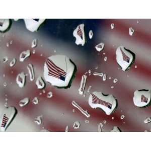 Flag at a Lawrence, Kan., Restaurant is Refracted in Rain Drops on a 