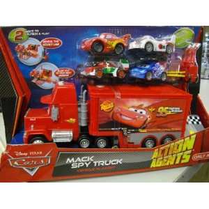 Disney Pixar Cars Mack Spy Truck Vehicle Playset with 4 Small Cars and 