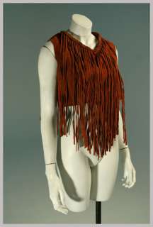   vest top long fringe from braided trim at neck sleeveless metal snaps
