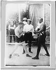 Boxers Marty Cutler,Jack Johnson in ring,with Burns,referee 