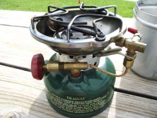 1966 Coleman 502 single Burner Stove in Canister with Handle dated 1 
