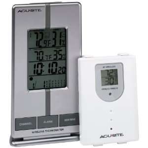   Thermometer with Humidity Clock and Remote Sensor