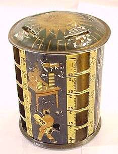 VINTAGE ROTARY TIN COIN BANK SUPER COMIC DESIGN MUST C.  