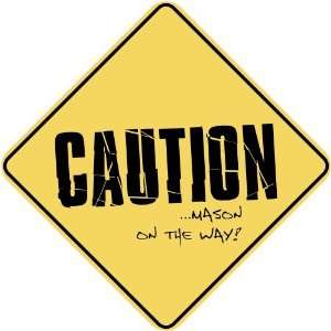 CAUTION  MASON ON THE WAY  CROSSING SIGN 