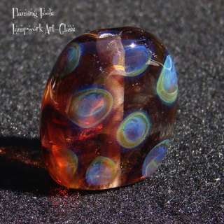   hand made lampwork bead by flaming fools self representing artists
