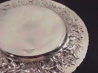 This sterling silver butter plate was made by S. Kirk & Son. It is in 