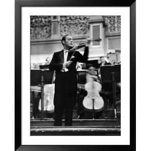 Violin Virtuoso Jascha Heifetz with Violin and Bow During Concert, as 