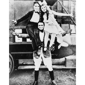 1915 photo Mary Pickford and Charlie Chaplin seated on shoulders of 